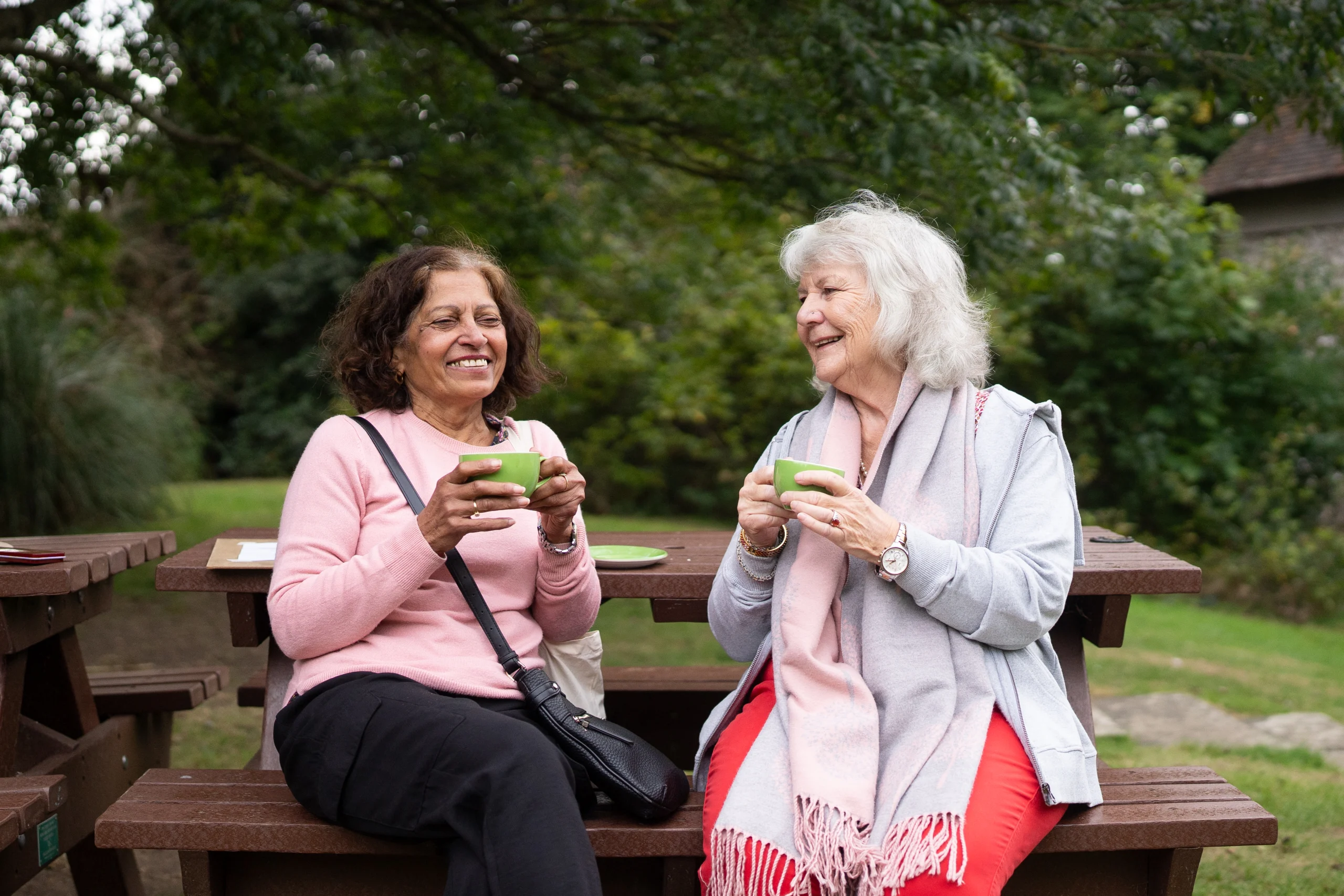 Women sharing tea together